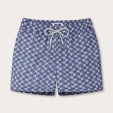 Boys Go With the Flow Staniel Swim Shorts featuring a playful print of Moorish Idol fish on a blue background. Crafted from 100% recycled fabric.