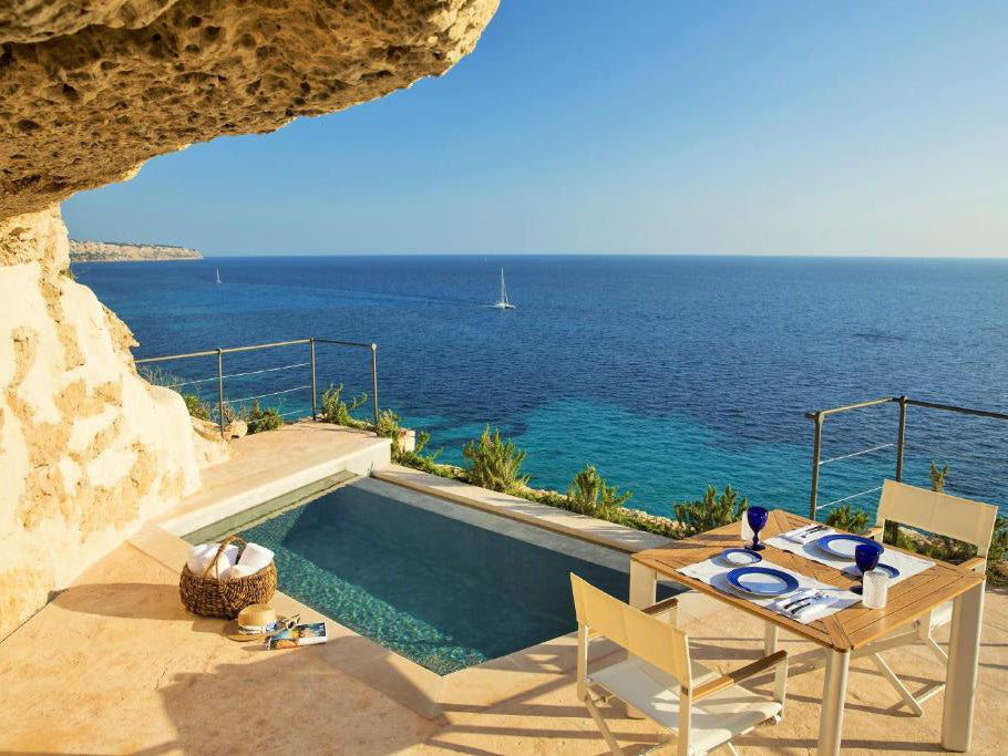 Cap Rocat swimming pool. Named as one of the most luxurious swimming pools in the world it sits in a rockface overlooking the sea