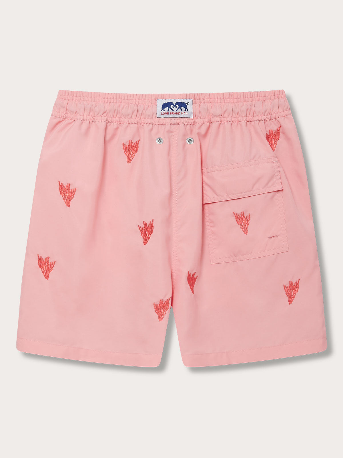 Men's Coral Colony Embroidered Staniel Swim Shorts in pastel pink with coral reef embroidery. Embroidered swim shorts featuring a rear pocket and an elastic waistband.