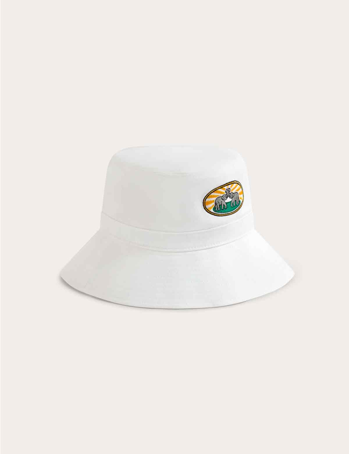 White cotton twill bucket hat featuring vibrant woven patches of the G.E.M. love heart logo and The G.E.M. ribbon.