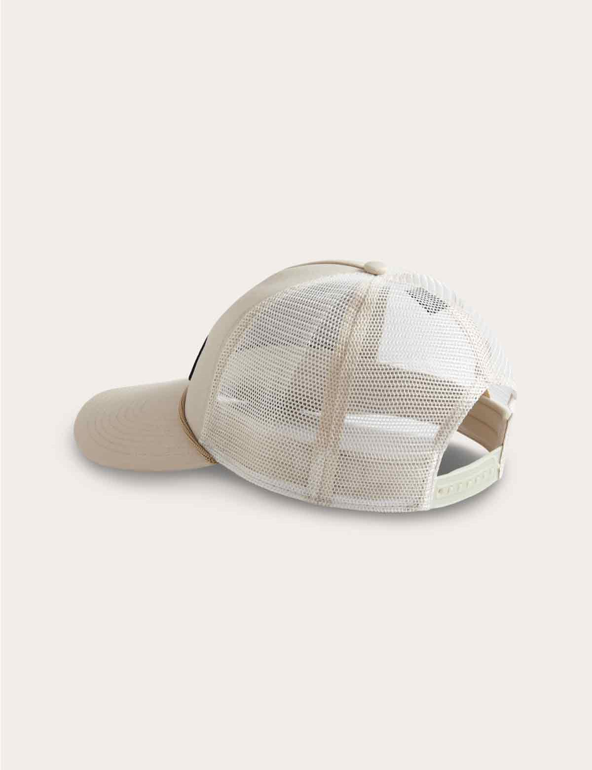 Stone-colored adjustable trucker cap with mesh back, curved visor, and "The Great Elephant Migration" logo label at the front.