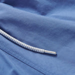 Deep Blue Staniel Swim Shorts close-up. Blue plain swim shorts featuring drawstring.