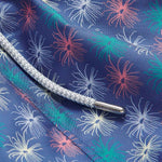 Close-up view of Men's Dont be Anemone Staniel Swim Shorts. Patterned swim shorts featuring colorful sea anemone print and braided drawstring.