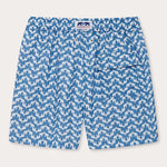 elephant palace blue mens swim shorts. This patterned swim shorts design features white elephants raising their trunks to create a pattern that resembles Indian palaces on a blue background.