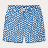 Elephant Palace Blue Staniel mens swim shorts front. Patterned swim shorts featuring white elephants raising their trunks to create a pattern that resembles Indian palaces on a blue background.