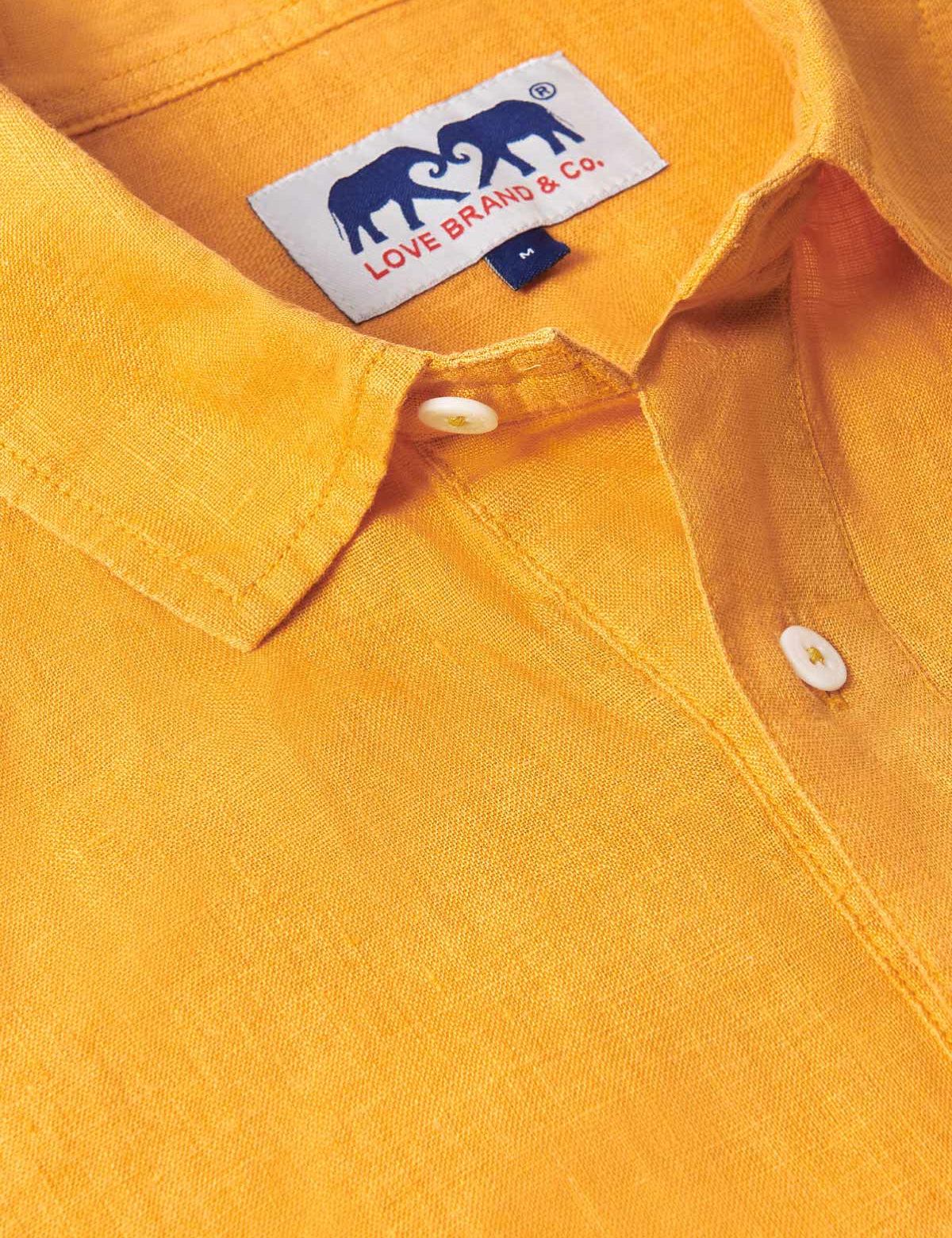 Men’s Golden Hour Hoffman Linen Shirt in vibrant yellow with a half-buttoned design and a label from Love Brand & Co.