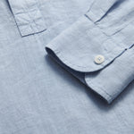 Hoffman Sky Blue mens Linen Shirt. Close-up view of our half button-up blue linen shirt.