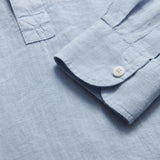 Hoffman Sky Blue mens Linen Shirt. Close-up view of our half button-up blue linen shirt.