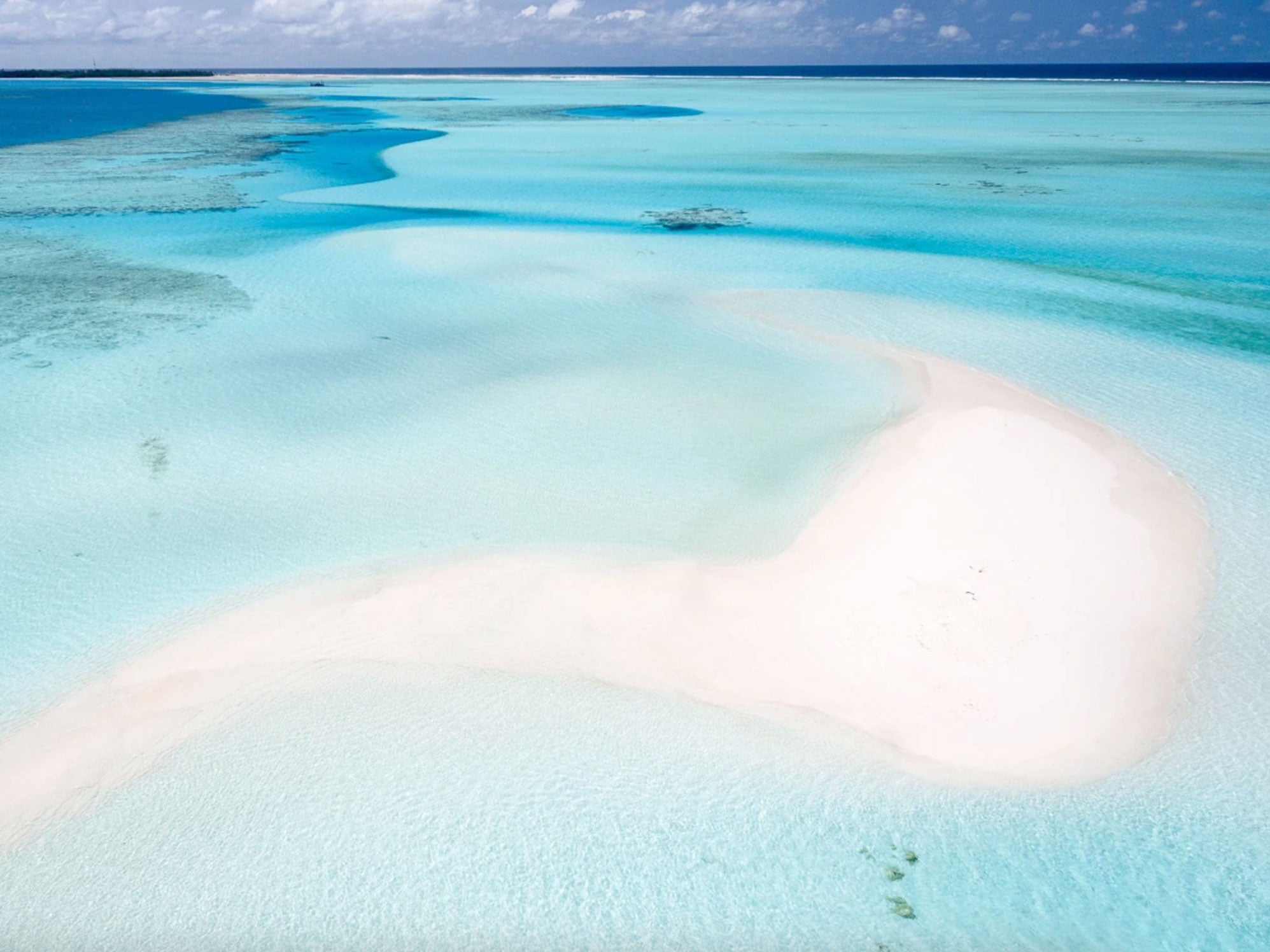 Aerial view of the waters surrounding Kamalame Cay