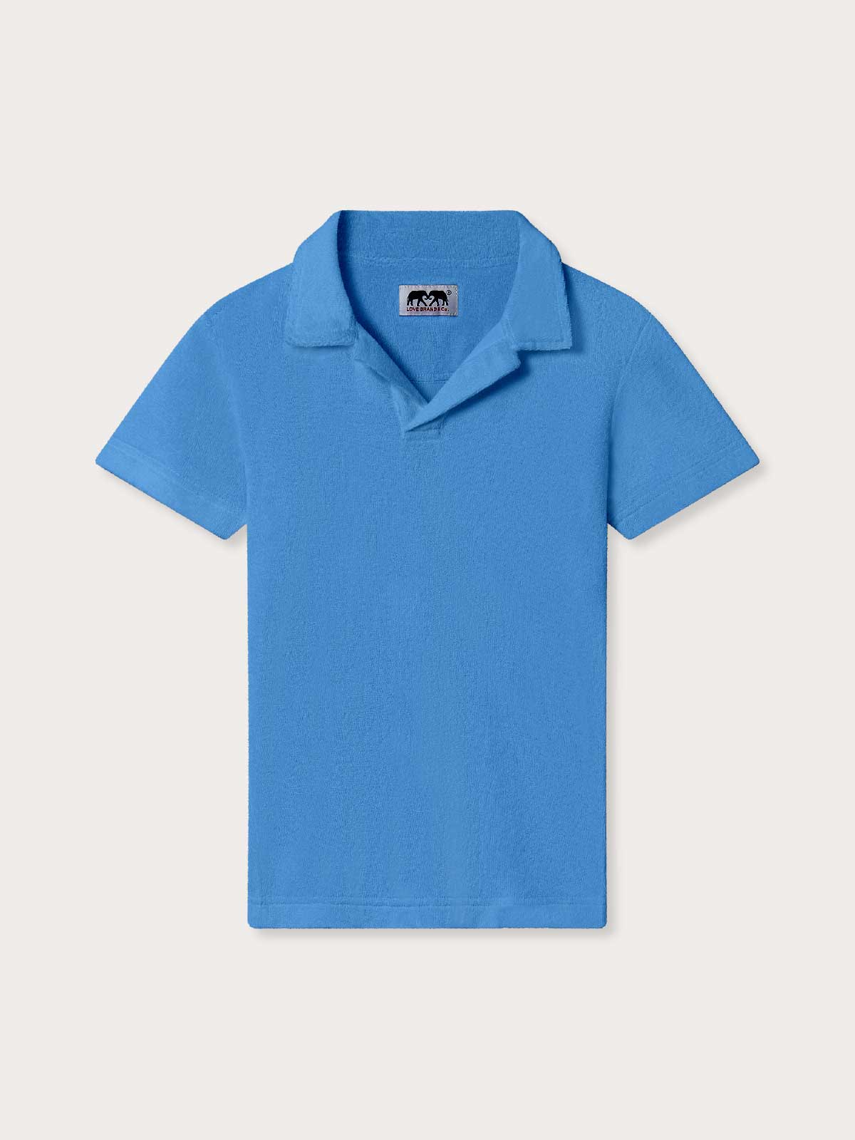 Front view of yacht blue terry towelling shirt for kids.