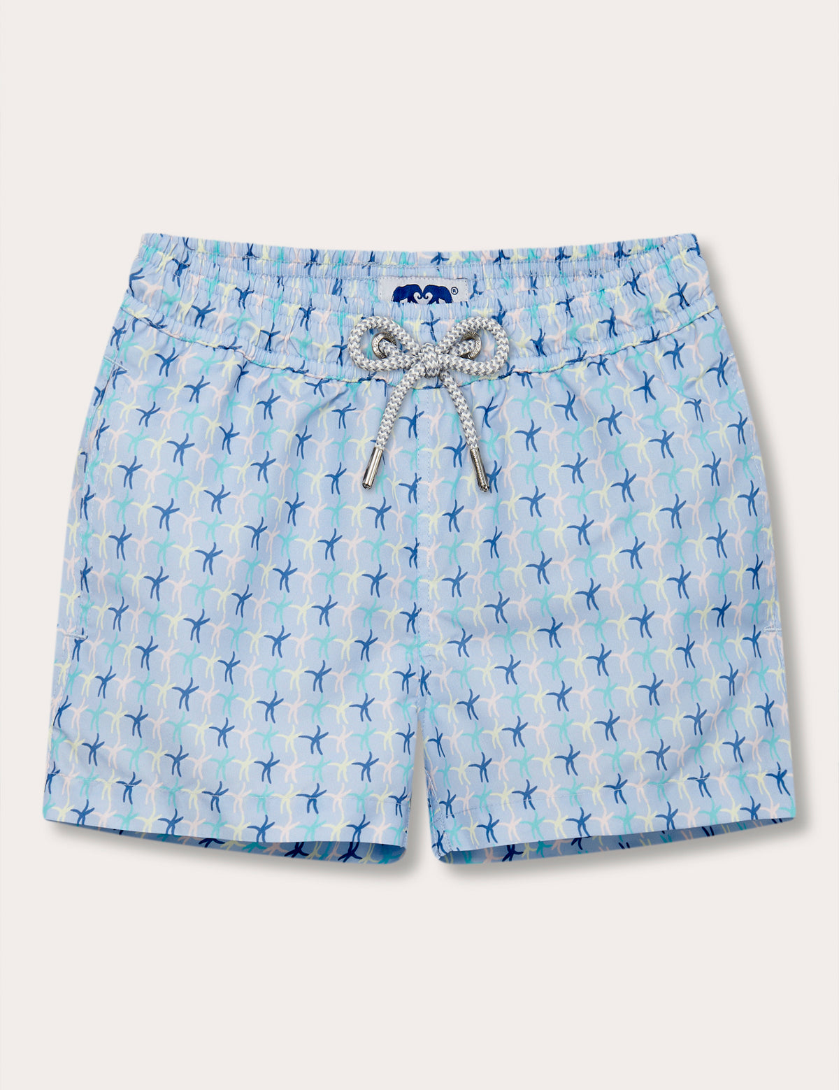 Boys Star Dancer Staniel Swim Shorts featuring playful sea star print in pastel pink, limoncello, cay green, and ocean blue on quick-drying, recycled fabric.