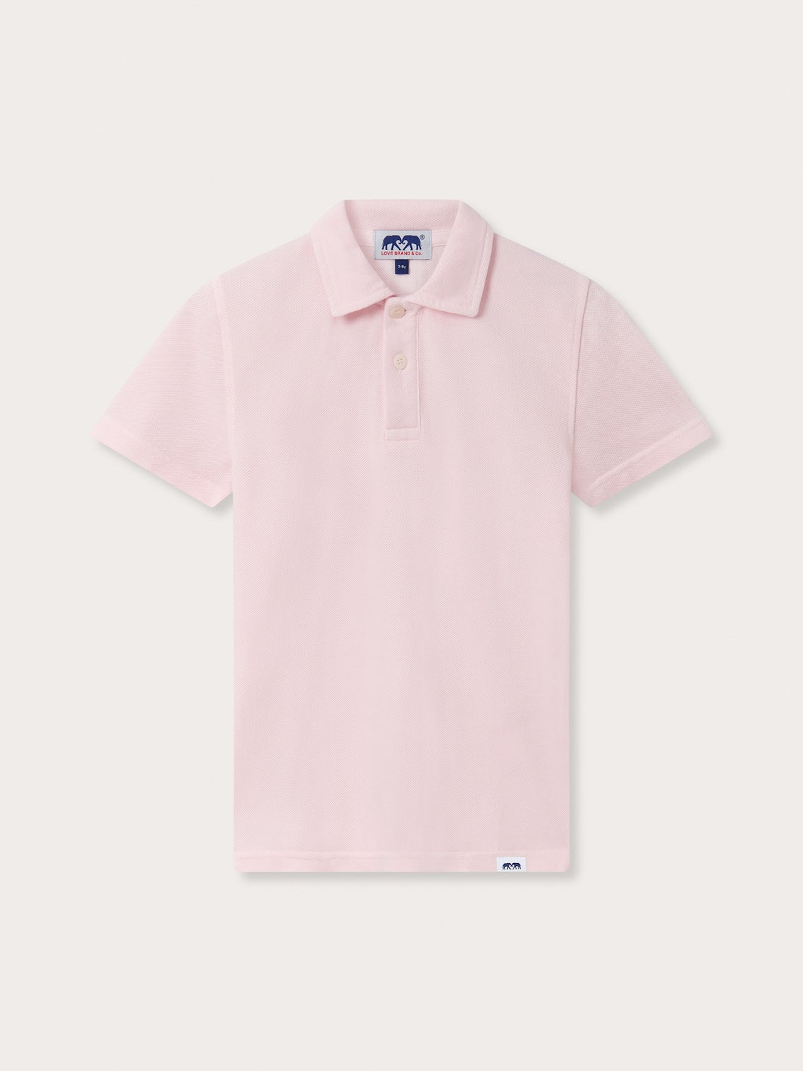 Front view of Kids Pastel Pink Pensacola With Tab Polo Shirt. Childrens pink polo shirt with short sleeves.