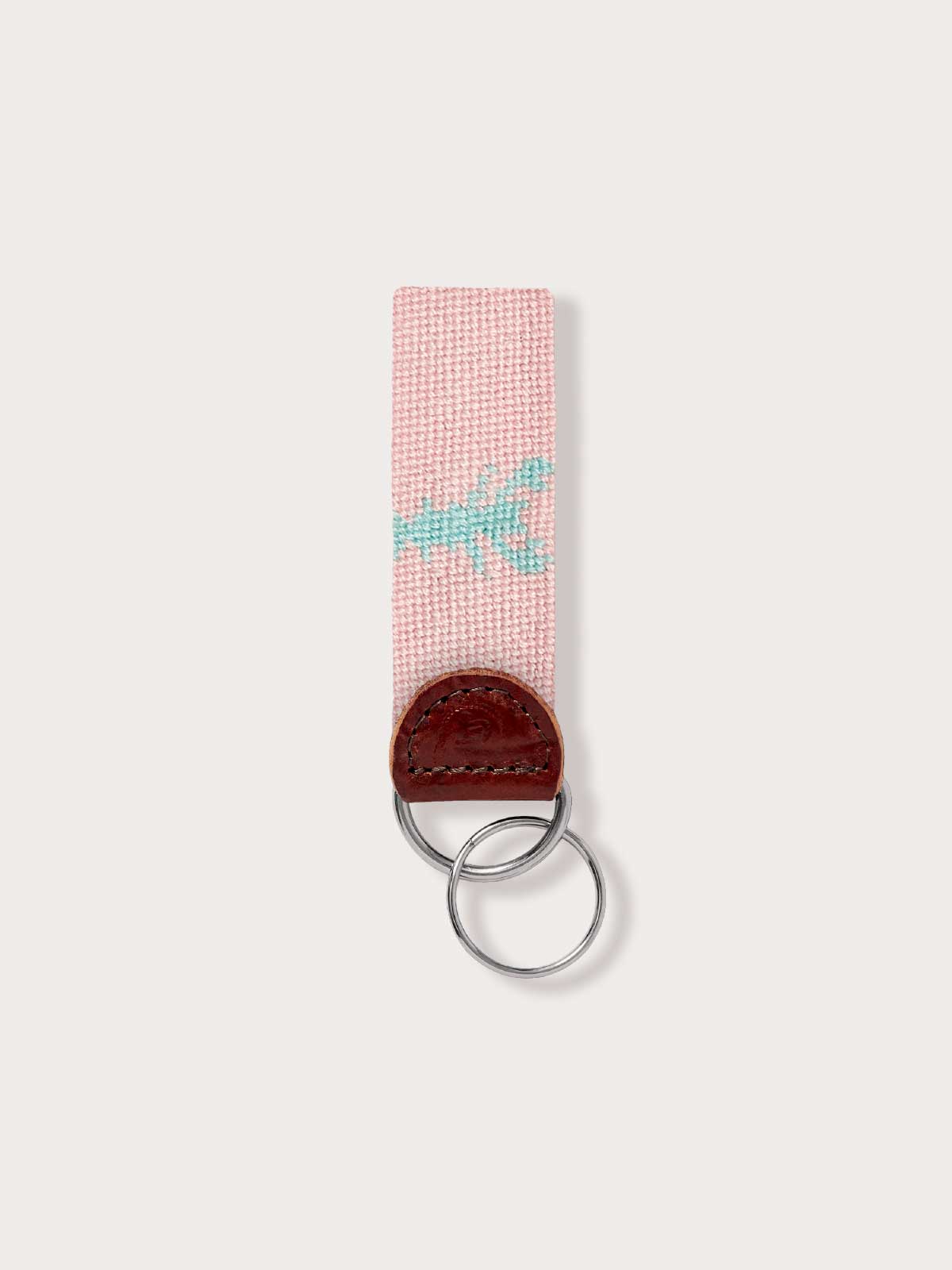 Pink keyring with lobster design and leather attachment.