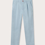 Sky blue chinos for men front view. Men's Sky Blue Lyford Chino trousers showing 2 front slash pockets, waistband with belt loops, and brown corozo nut button fastening. 