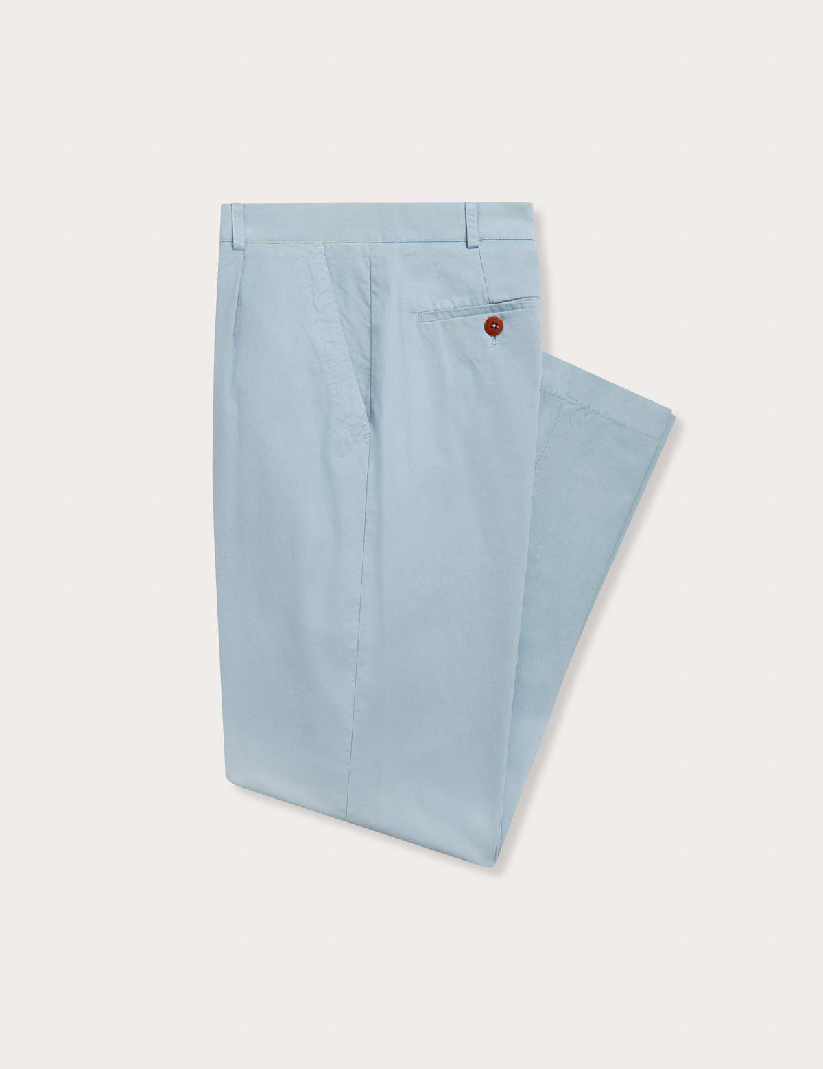 Side view of sky blue cotton chinos for men showing front and rear pockets.