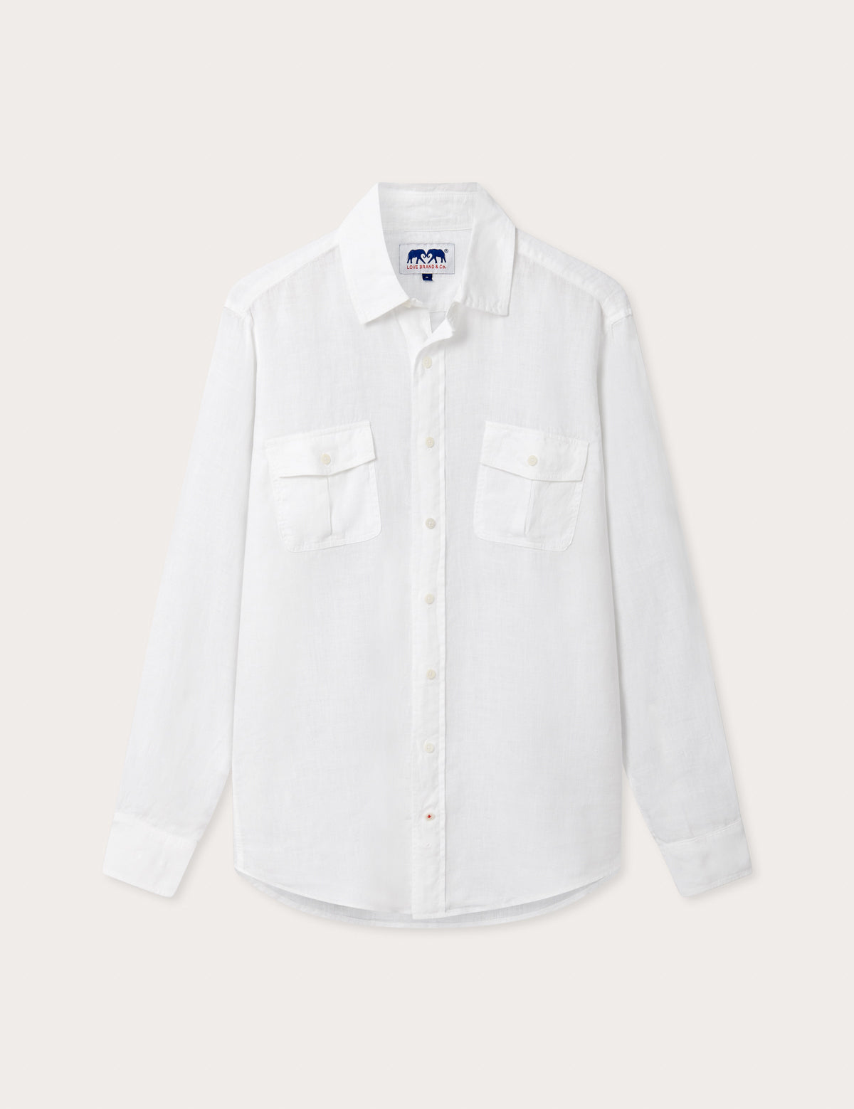 Men's White Andros Linen Shirt. Long-sleeved, button-up white linen shirt. Double-breasted with a classic collar.