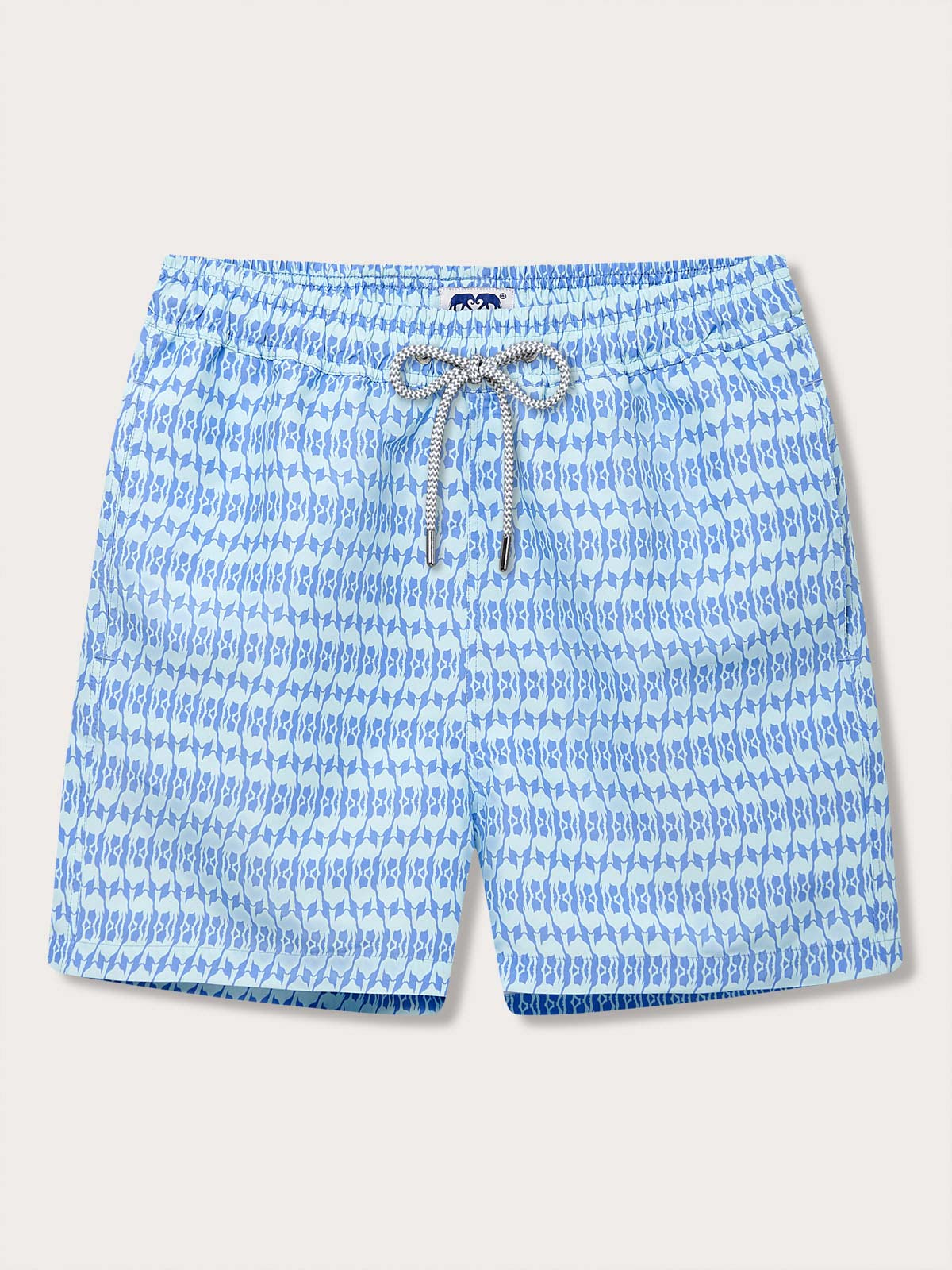 Men's Camel Mirage Sky Staniel Swim Shorts with a blue desert mirage pattern. Patterned swim shorts promoting environmental awareness through design inspired by Cop28 in Dubai 2023.