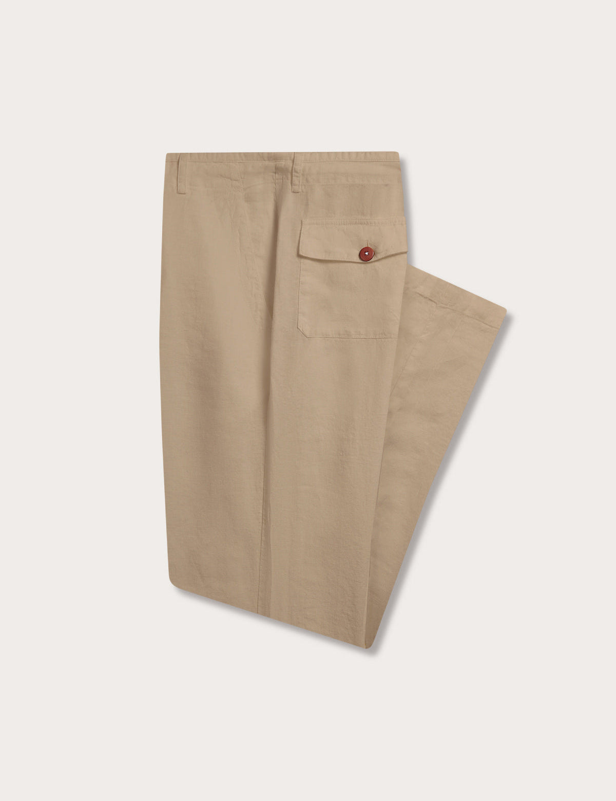 Side view of Mens Coconut Randall Linen trousers. Beige linen pants with handy pockets.