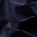 Detailed view of men's cotton chinos navy blue fabric