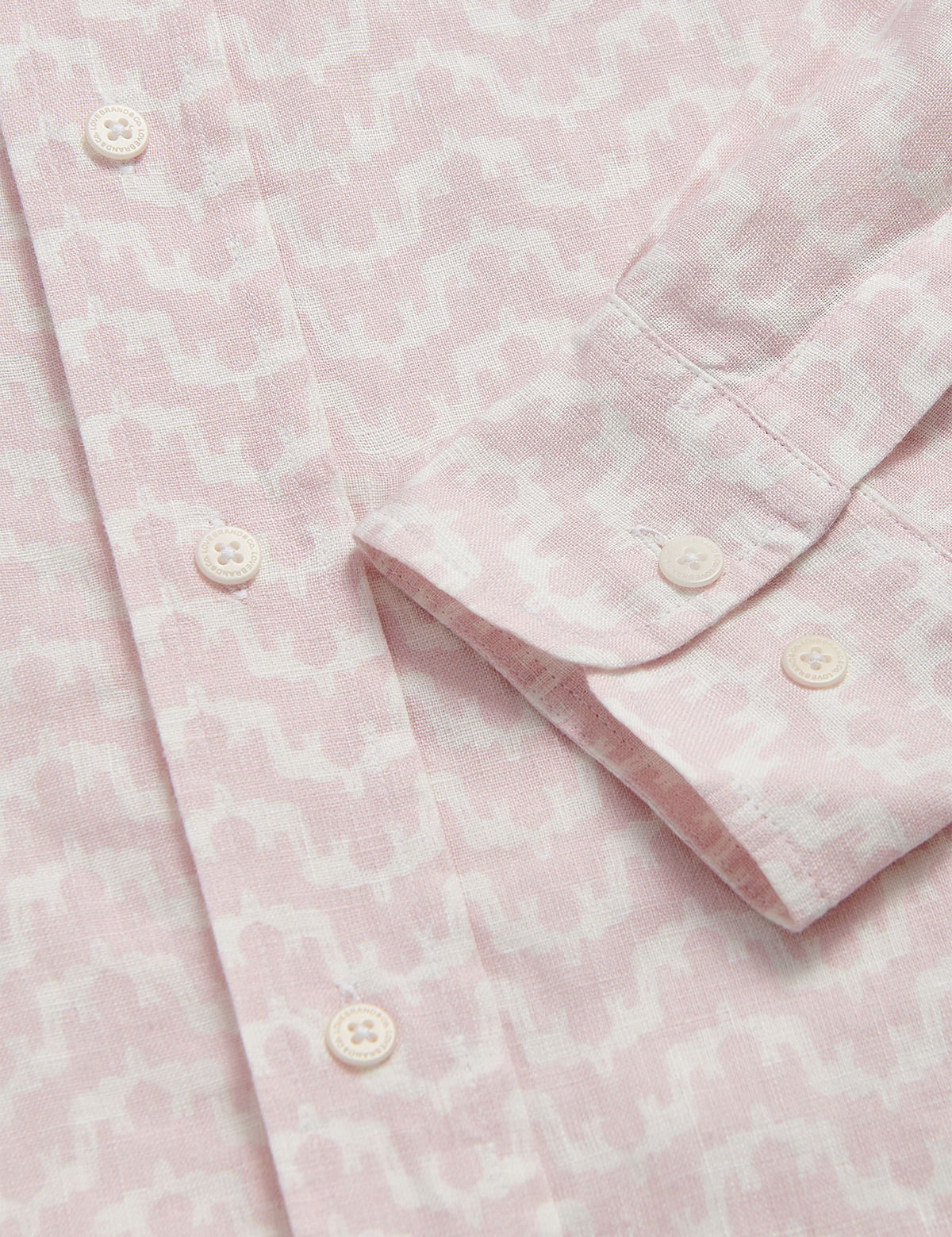 Men's Elephant Palace Pink Abaco Linen Shirt close-up, showcasing lightweight linen fabric and button details.