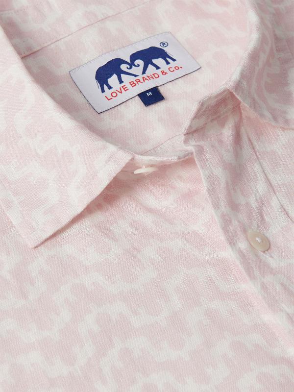 Men's Elephant Palace Pink Abaco Linen Shirt close-up showcasing the collar, button, and tag with elephant logo. Old money shirts made from 100% linen.