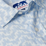 Close-up of Men's Elephant Palace Sky Abaco Linen Shirt featuring a blue and white patterned elephant and palace print.