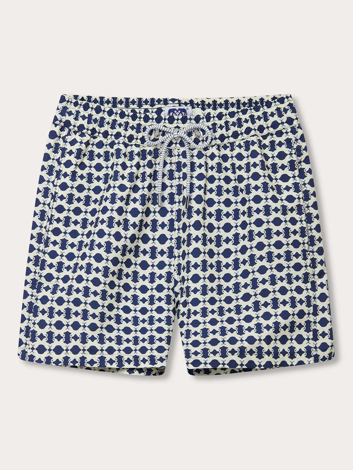 Men's Eye of the Tiger Staniel Swim Shorts front view. The patterned swim shorts show stone coloured tigers on a Chambray Blue background.