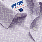 Close-up view of Men's Crazy Maze Abaco Linen Shirt. Long-sleeved, button-up white and purple patterned linen shirt. 