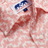 Close-up of Men's Elephant Palace Strawberry Abaco Linen Shirt. White and pink linen shirt featuring bestselling elephant palace print. Long-sleeved, button-up shirt in a relaxed fit.