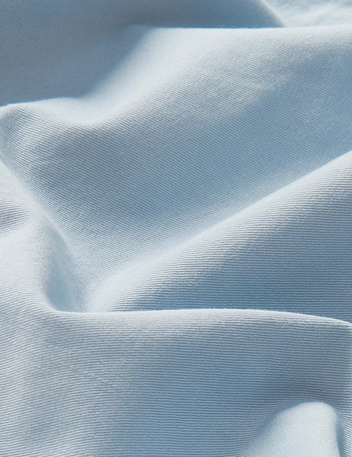 Detailed view of 100% cotton fabric of Sky Blue mens chinos