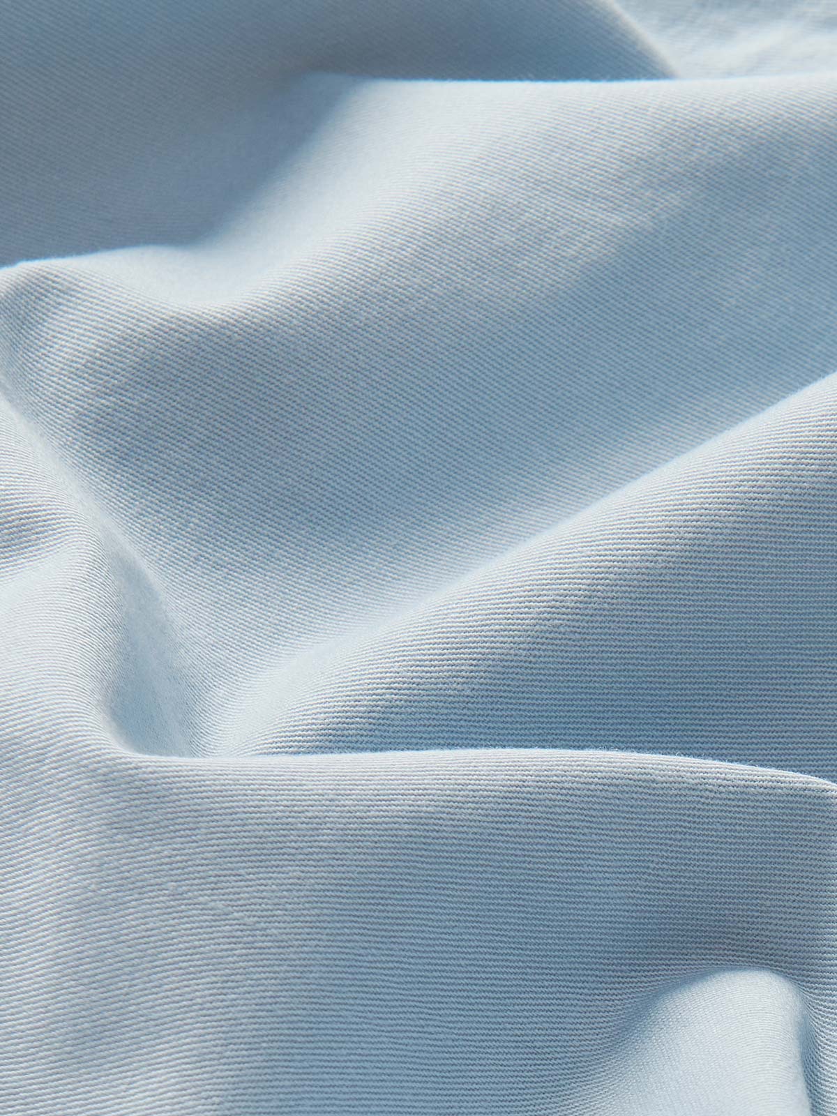 Detailed view of 100% cotton fabric of Sky Blue mens chinos