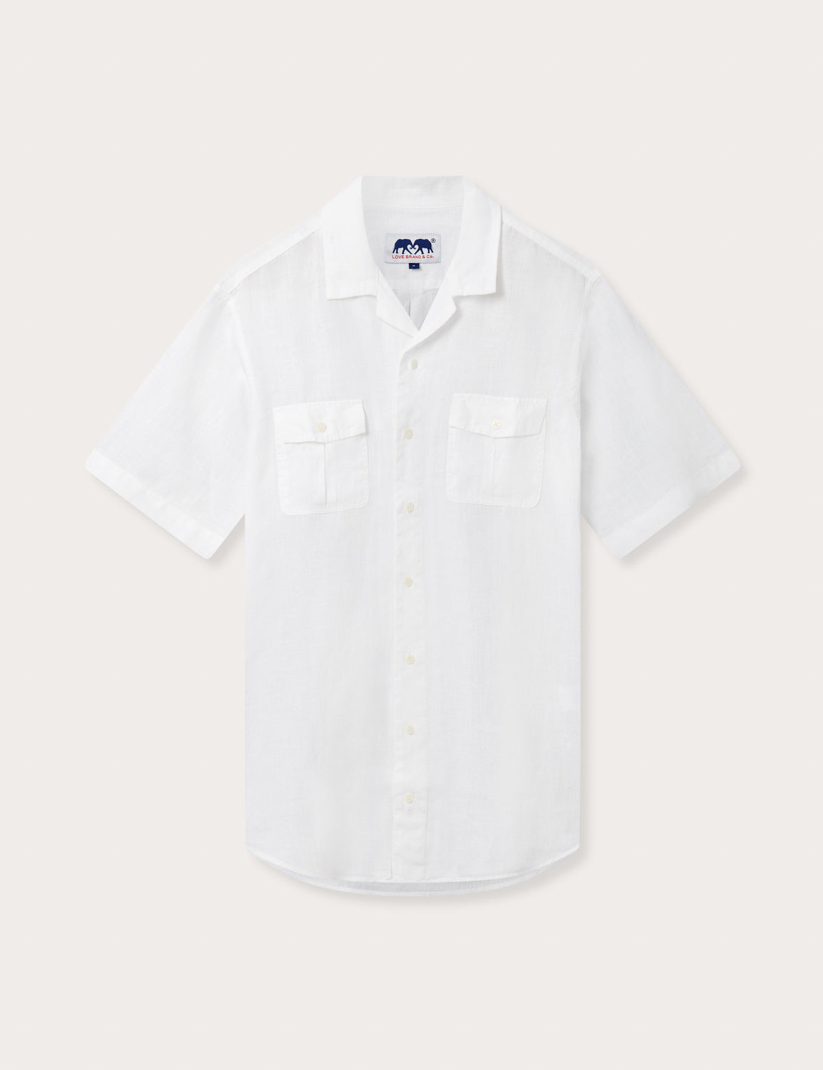 Men's White Normans Linen Shirt. Short sleeved mens linen shirt with camp collar and two double breast pockets.