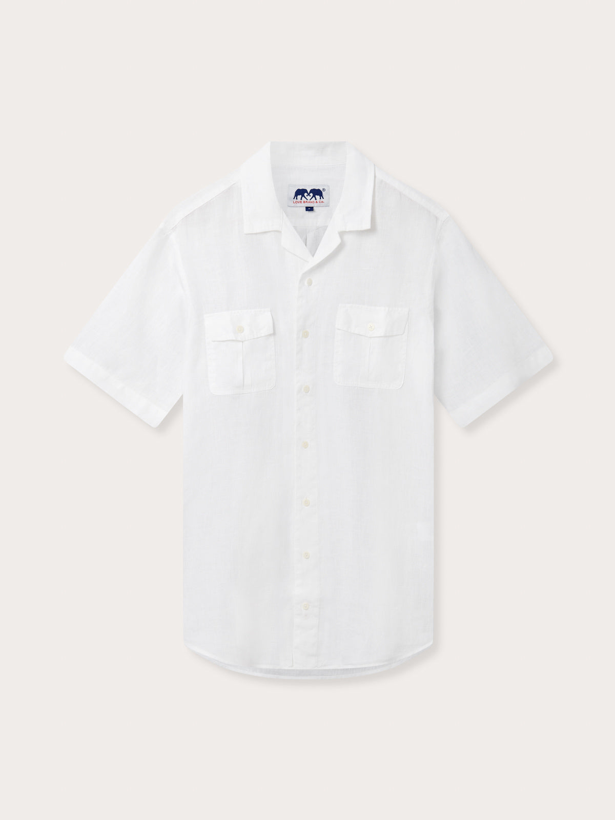 Men's White Normans Linen Shirt. Short sleeved mens linen shirt with camp collar and two double breast pockets.