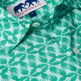 Close-up of Men's Palm Eagle Abaco Linen Shirt showcasing tropical palm leaves and eagle design with brand label. Old money shirts made from 100% linen.