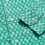 Men's Palm Eagle Abaco Linen Shirt close-up featuring tropical palm leaf and eagle pattern in green and white. Old money shirts made from 100% linen.