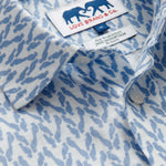 Men's Parrot Paradise Abaco Linen Shirt by LOVE BRAND & Co. Blue and white long-sleeved mens linen shirt with button up design.