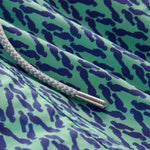 Detailed view of Men's Parrot Paradise Staniel Swim Shorts. Close-up view of drawstring and parrot patterned design.