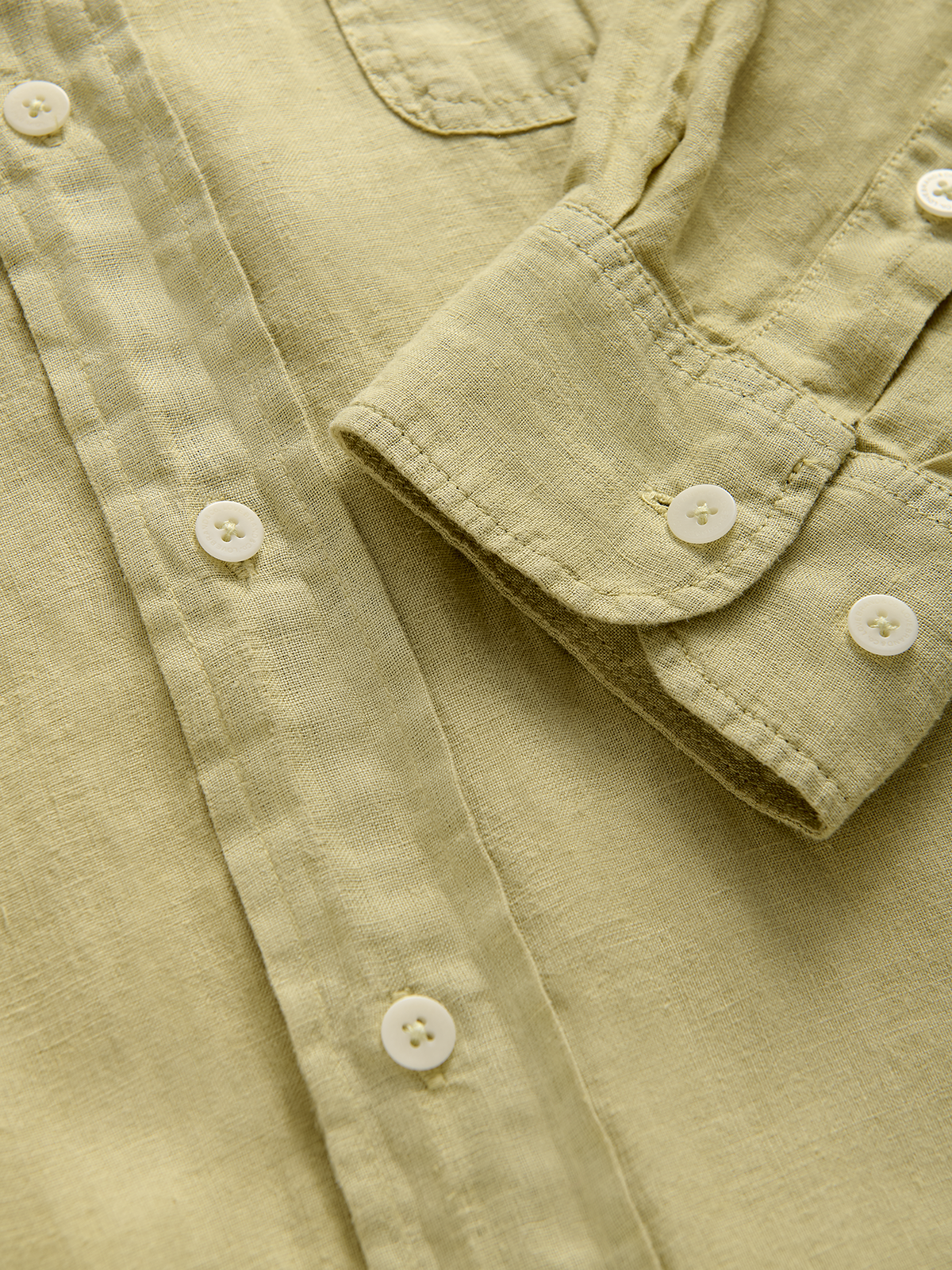 Cuff view of a khaki hemp shirt