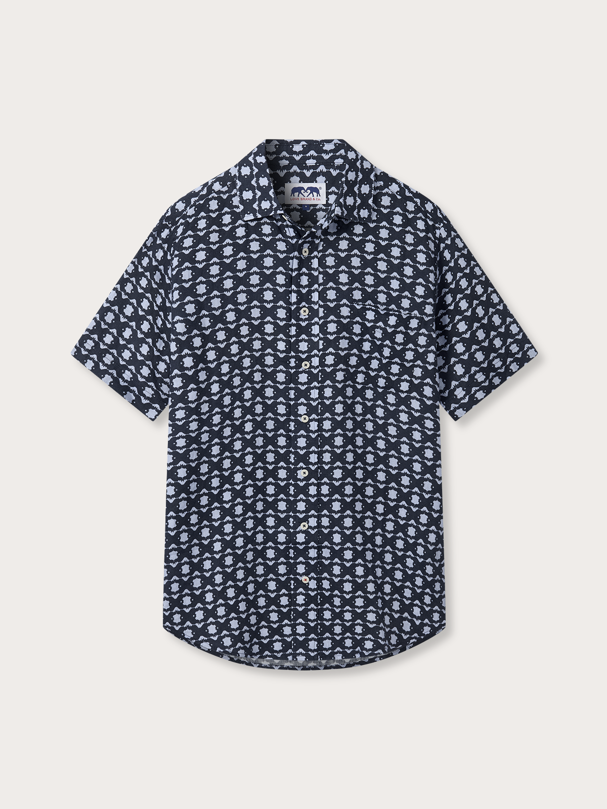 Navy patterned short-sleeve shirt on a light grey background