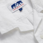 Men's White Normans Linen Shirt. Short sleeved mens linen shirt with camp collar and two double breast pockets.