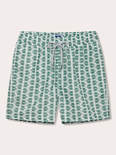 Mens Staniel Dolphins of greece swim shorts Front. This design features a pattern of green dolphins on an off-white background.