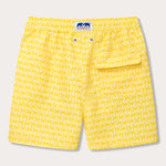 Yellow men's swim shorts with a patterned design inspired by endangered turtles. Patterned swim shorts featuring an elastic waistband and a front pocket.