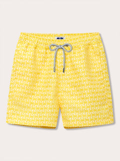 Men's Turtle Light Staniel Swim Shorts featuring a vibrant yellow pattern inspired by baby turtles. Patterned swim short highlighting the turtle nesting season and conservation efforts, with an elastic waistband and drawstring.