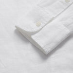 Detailed view of the cuffs of Men's White Windermere Linen Long Sleeve Hoodie. Long-sleeved half-button-up 100% linen hoodie. 2 front pockets with a drawstring hood.