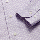 Detailed view of Men's Crazy Maze Abaco Linen Shirt. Long-sleeved, button-up white and purple patterned linen shirt. 