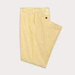 Side view of men's yellow chino trousers.