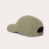 Olive green linen cap with a classic design and an embroidered logo, perfect for men.