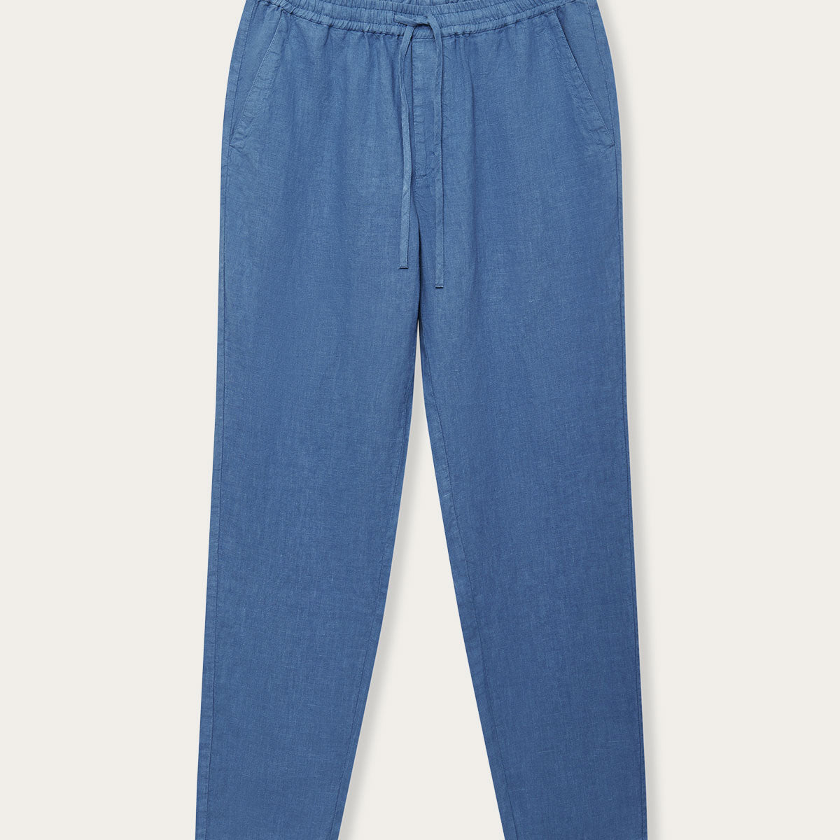 Men's Deep Blue Eleuthera Linen Trousers. Men's blue linen trousers with drawstring waist and side pockets.