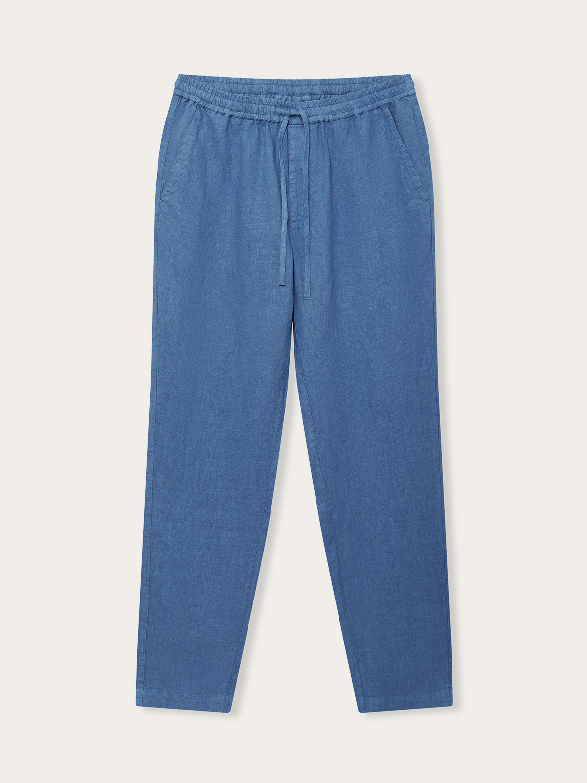 Men's Deep Blue Eleuthera Linen Trousers. Men's blue linen trousers with drawstring waist and side pockets.