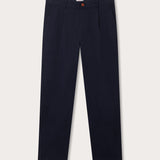 Front view of navy blue cotton chinos. Men's Navy Lyford Chino trousers showing 2 front slash pockets, waistband with belt loops and finished with a brown corozo nut button fastening. 